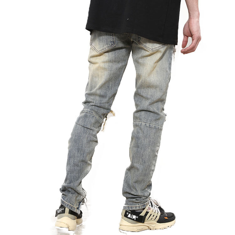 Ripped Washed Elastic Mid-waist Denim Trousers